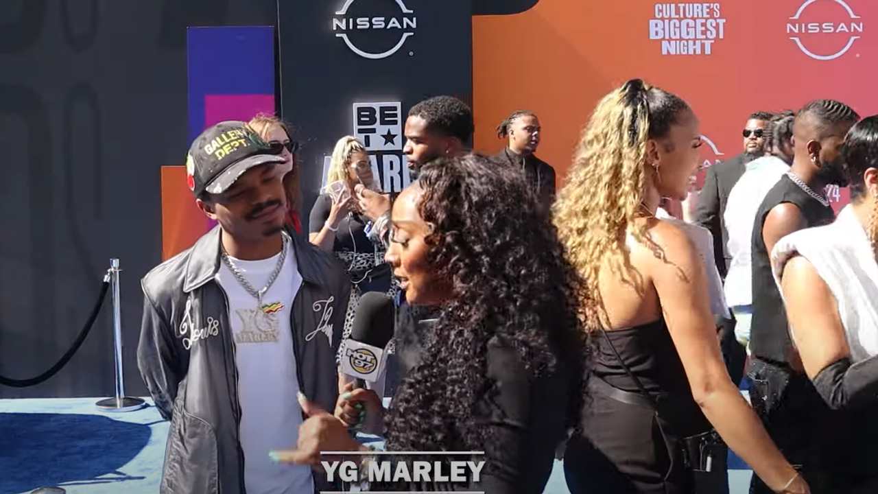 YG Marley Joins HOT 97 On The BET Awards Blue Carpet [6/30/2024]